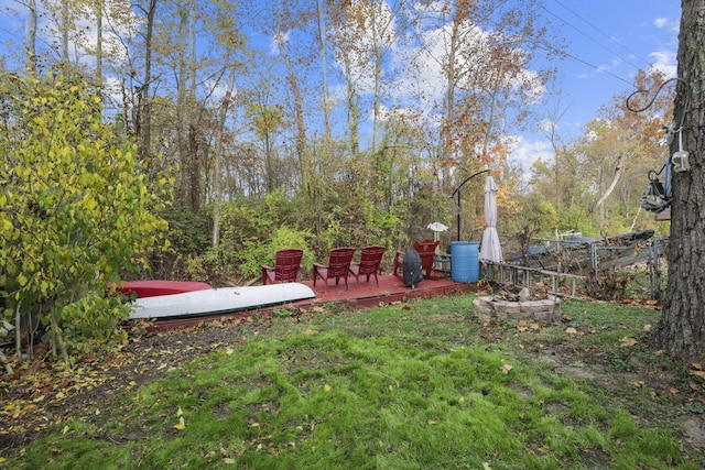 view of yard featuring a wooden deck