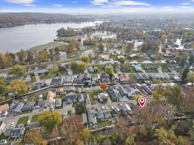 drone / aerial view featuring a water view