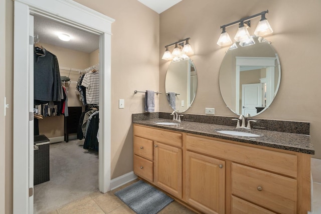 bathroom featuring vanity and tile patterned floors