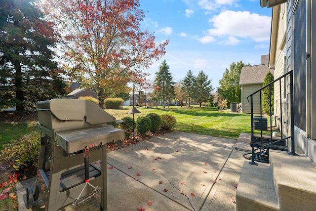 view of patio featuring a grill