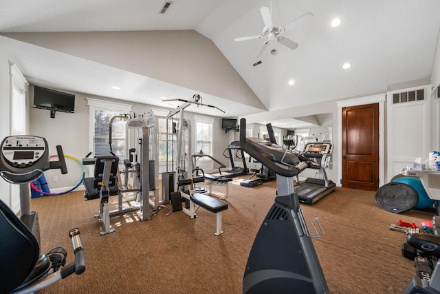 gym featuring ceiling fan, carpet, and high vaulted ceiling