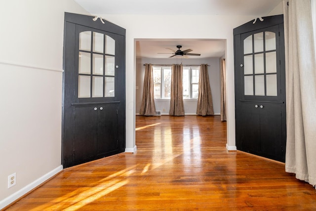 entrance foyer featuring hardwood / wood-style floors and ceiling fan