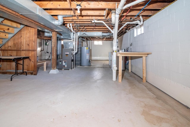 basement with heating unit and water heater