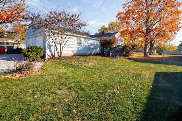 view of yard with a garage