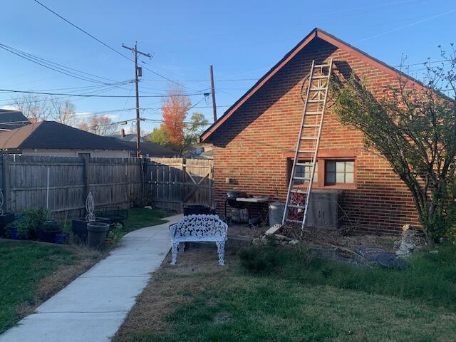 view of home's exterior featuring a lawn