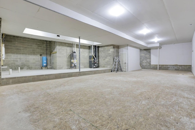 basement with heating unit and water heater