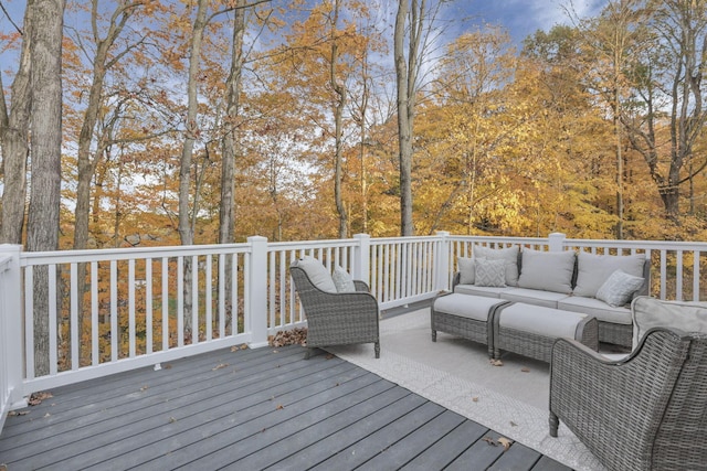 wooden terrace with outdoor lounge area