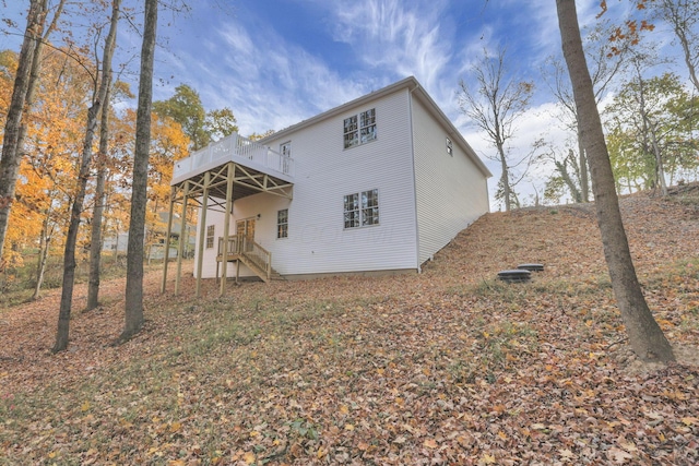 rear view of house with a deck