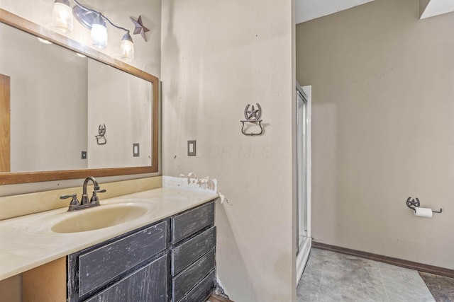 bathroom with vanity and an enclosed shower