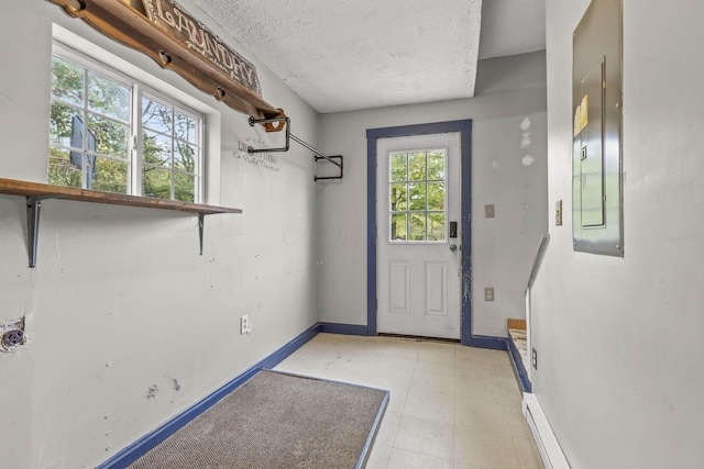 doorway featuring a textured ceiling