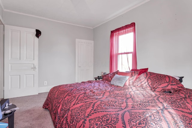 carpeted bedroom with crown molding