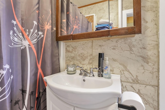 622 S Poplar St, Bucyrus, OH 44820 - bathroom with vanity and a shower with shower curtain