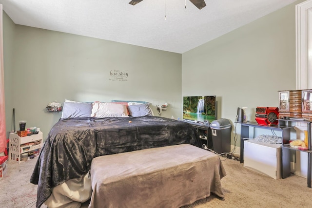 bedroom with ceiling fan and light colored carpet