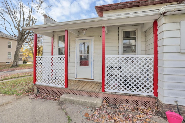 entrance to property with covered porch