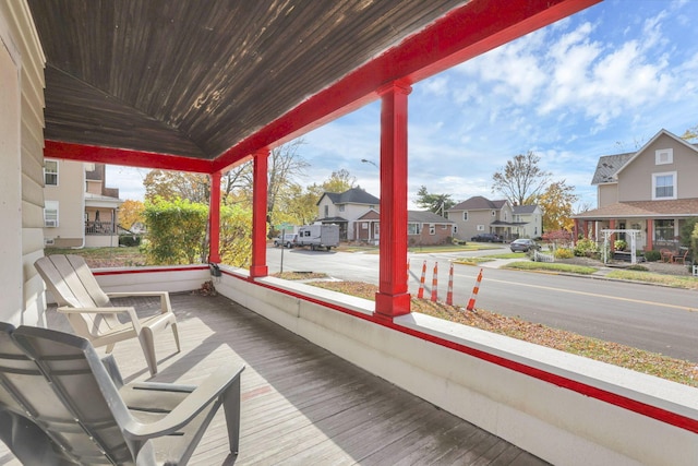 622 S Poplar St, Bucyrus, OH 44820 - wooden porch featuring a residential view