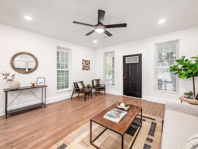 1327 Atcheson St, Columbus, OH 43203 - living room featuring light wood-type flooring, ceiling fan, and recessed lighting