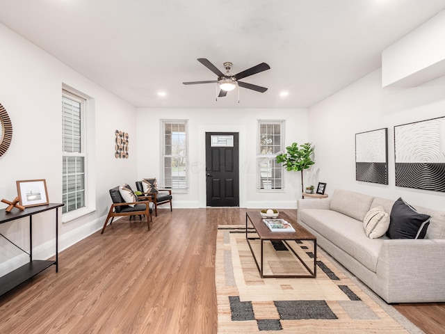1327 Atcheson St, Columbus, OH 43203 - living room with light wood-style floors, recessed lighting, and ceiling fan