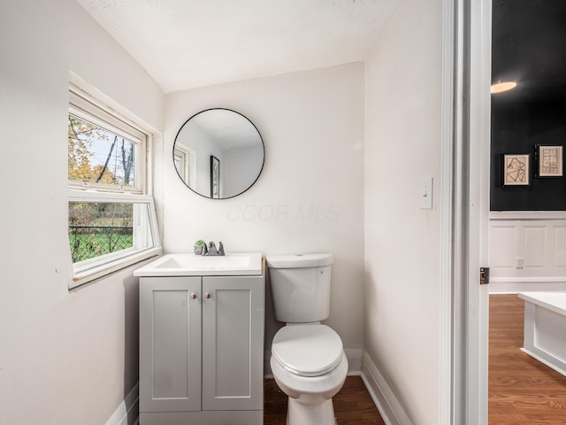 1327 Atcheson St, Columbus, OH 43203 - bathroom with vanity and wood finished floors