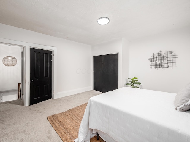 1327 Atcheson St, Columbus, OH 43203 - bedroom with carpet flooring and baseboards