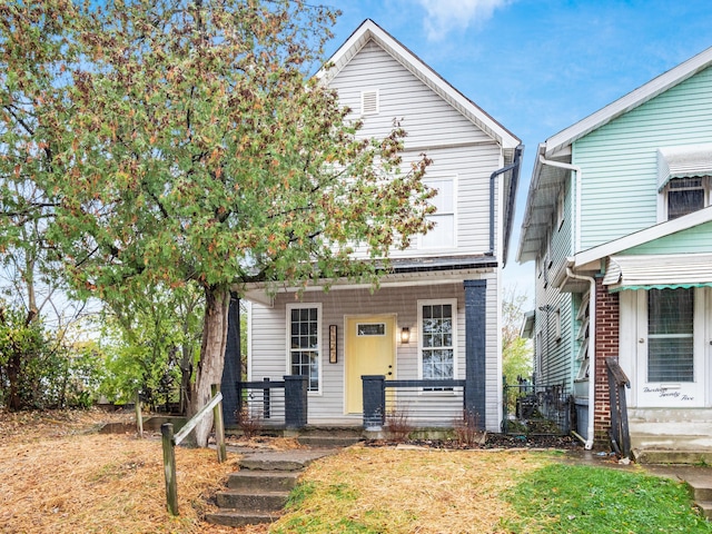 1327 Atcheson St, Columbus, OH 43203 - view of front of property with a porch and a front lawn