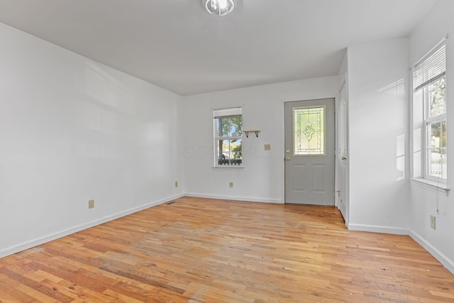 foyer with light wood-type flooring