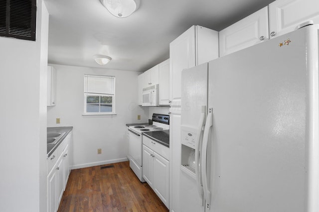 kitchen featuring white cabinets, white appliances, dark wood-type flooring, and sink