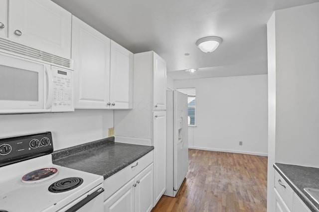 kitchen with white cabinetry, white appliances, and light wood-type flooring