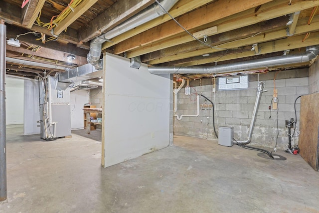 basement featuring heating unit