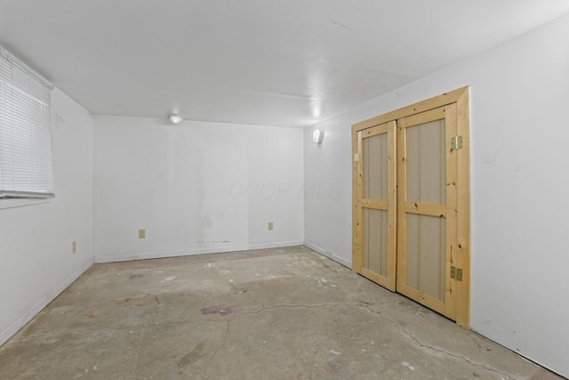 empty room featuring concrete floors