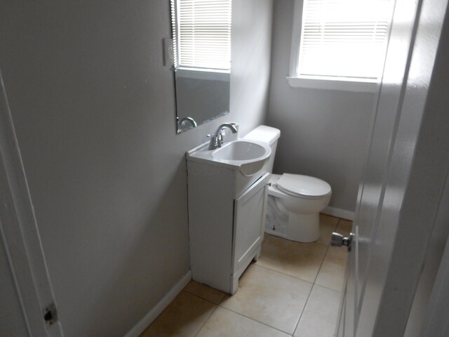 1447 Republic Ave, Columbus, OH 43211 - bathroom featuring tile patterned flooring, vanity, and toilet