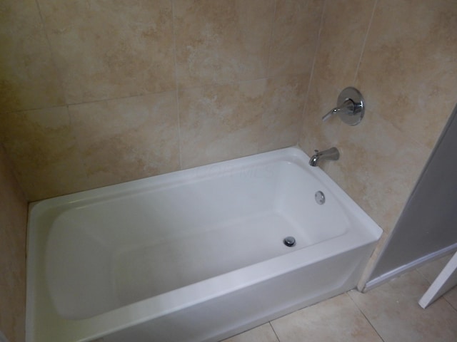 1447 Republic Ave, Columbus, OH 43211 - bathroom with a tub to relax in and tile patterned flooring