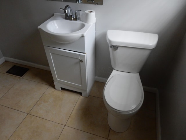 1447 Republic Ave, Columbus, OH 43211 - bathroom with toilet, vanity, and tile patterned floors