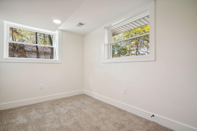 view of carpeted spare room