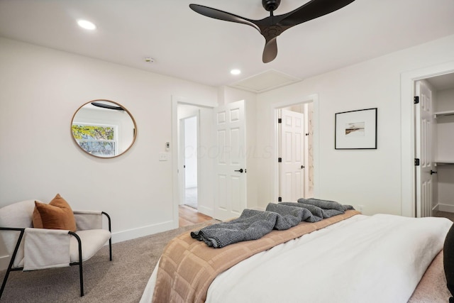 carpeted bedroom featuring ceiling fan