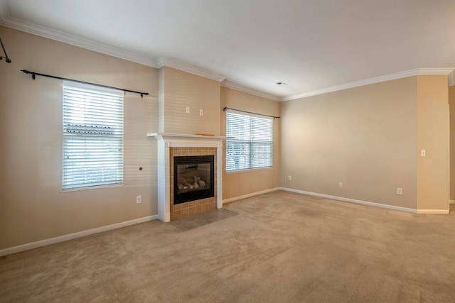 unfurnished living room featuring a fireplace, light carpet, and a wealth of natural light