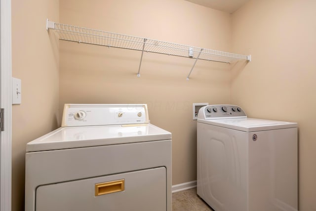 washroom featuring separate washer and dryer