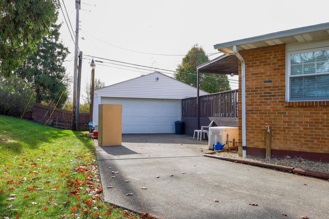 garage featuring a yard