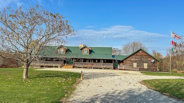 view of home's community featuring a yard