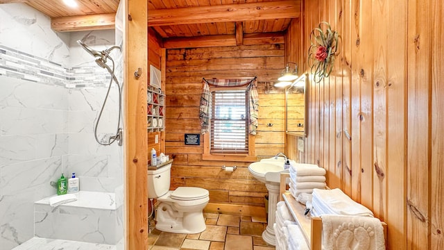 bathroom with beam ceiling, sink, wooden ceiling, wood walls, and toilet