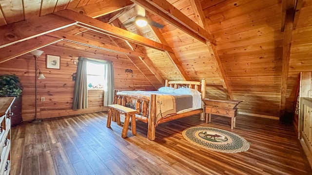 bedroom with vaulted ceiling with beams, wooden walls, wooden ceiling, and hardwood / wood-style flooring