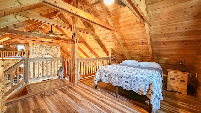 bedroom with wood-type flooring, vaulted ceiling with beams, wood walls, and wood ceiling