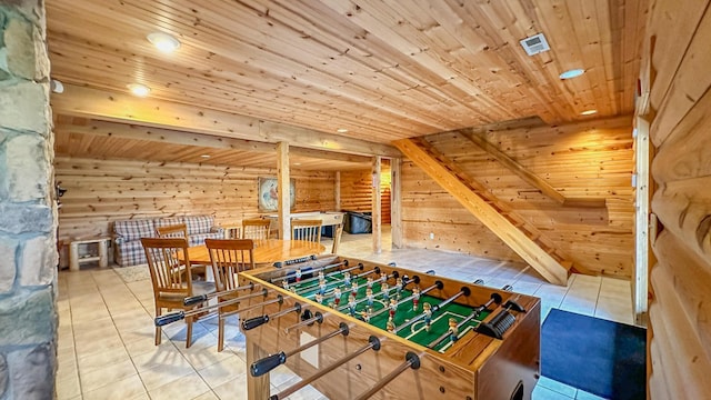 playroom featuring tile patterned floors, wooden ceiling, and wooden walls