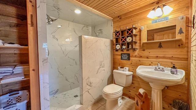 bathroom with walk in shower, tile patterned floors, wood walls, toilet, and wood ceiling