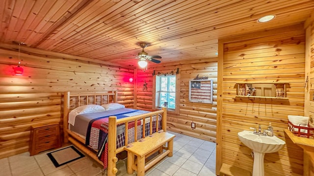 bedroom featuring wooden ceiling, light tile patterned floors, and log walls