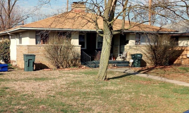 view of front of house with a front yard