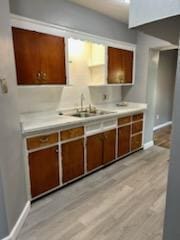 kitchen featuring sink and light hardwood / wood-style floors