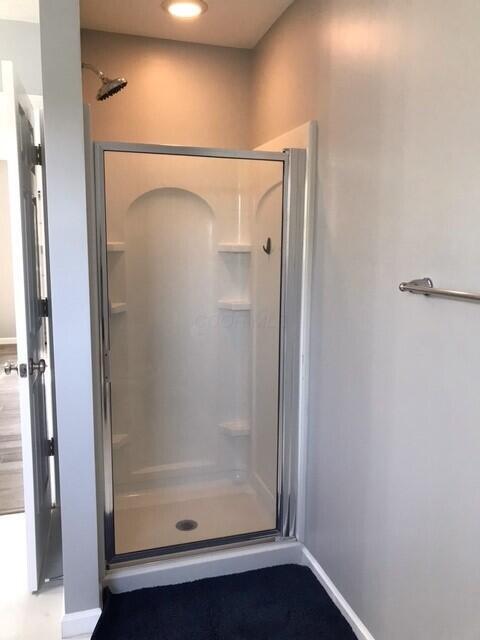 bathroom with walk in shower