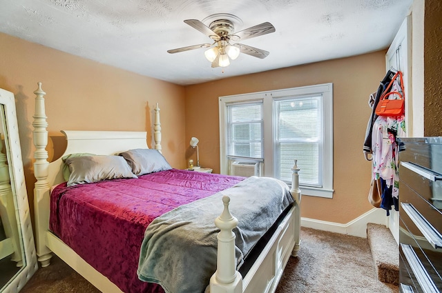 bedroom featuring a textured ceiling, carpet floors, ceiling fan, and cooling unit