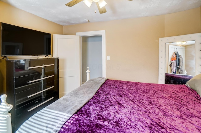 bedroom featuring ceiling fan