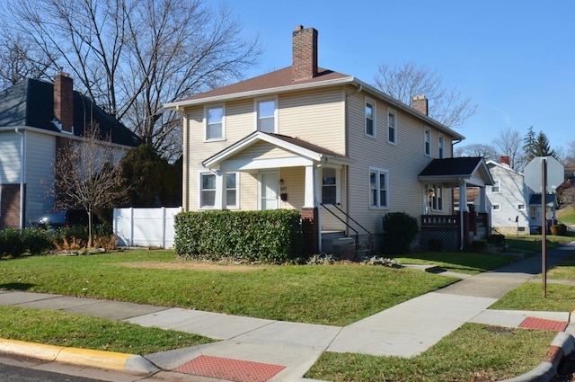 view of front of home with a front yard